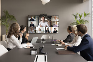 Office employees meeting on online video chat